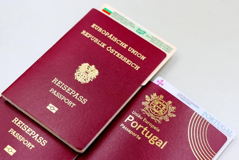 European passports and identity cards laid out on a table
